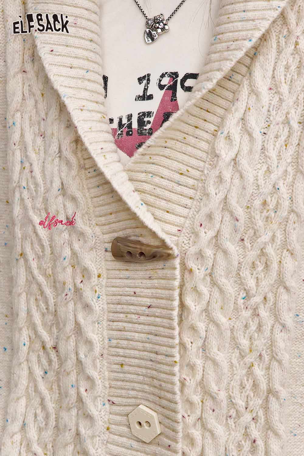 ELFSACK irregular button knit sweater with textured cable patterns and unique button design