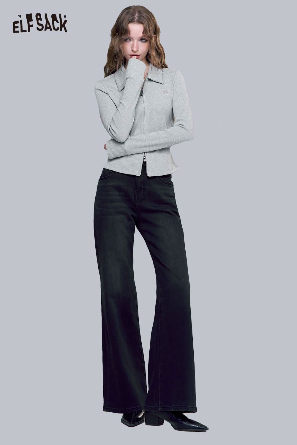 Light gray minimalist embroidered cardigan for women paired with black flared jeans