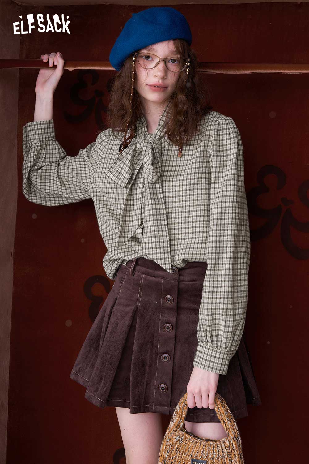 ELFSACK preppy bow tie blouse for women in checkered pattern, styled with a skirt and accessories
