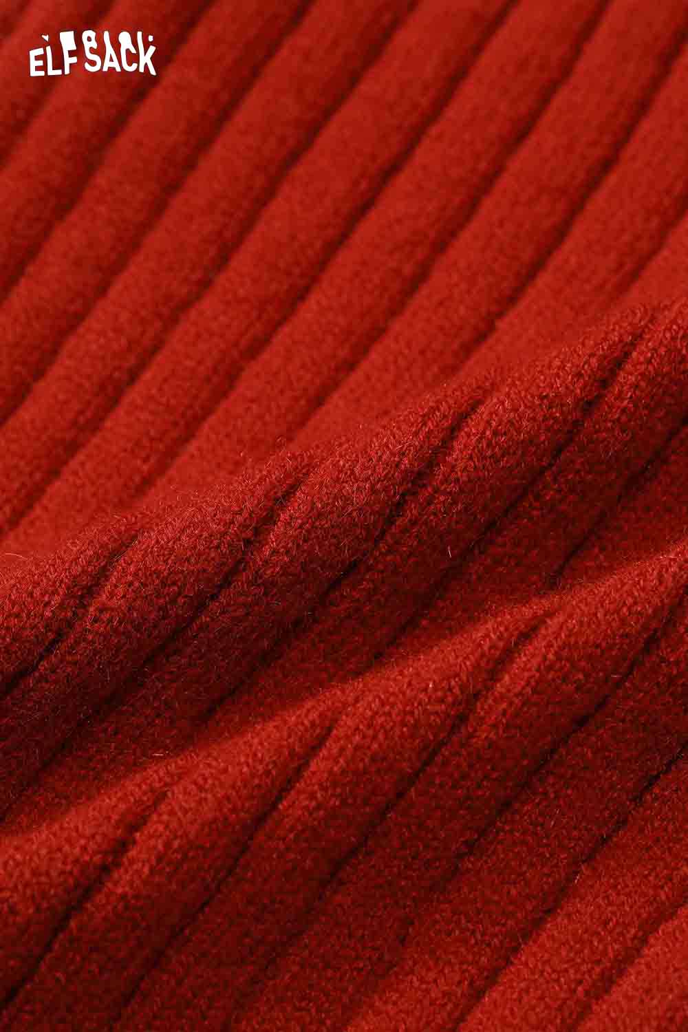 Close-up of ELFSACK slim fit heart logo knit sweater in rich red ribbed texture