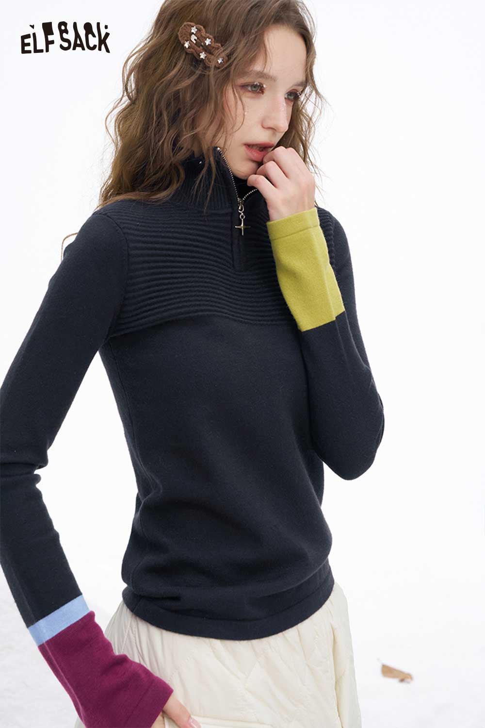 ELFSACK soft contrast sleeve knitwear featuring a zip collar and colorful arm details
