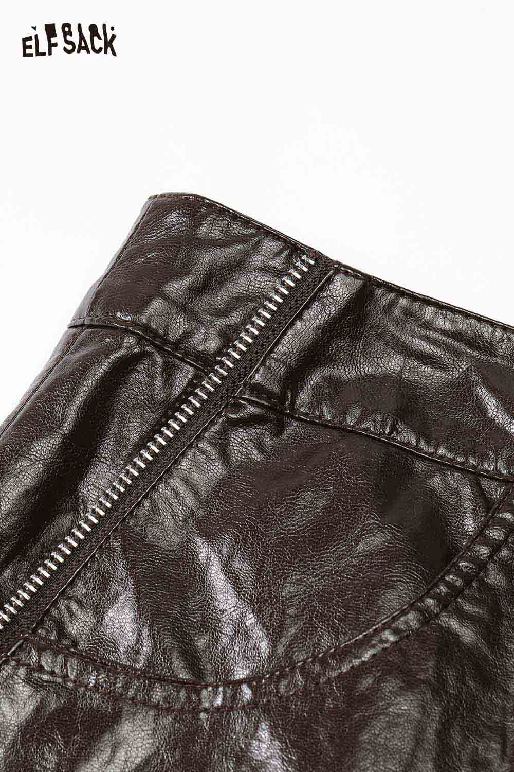 Close-up of ELFSACK soft shiny leather skirt showcasing the zipper detail and texture