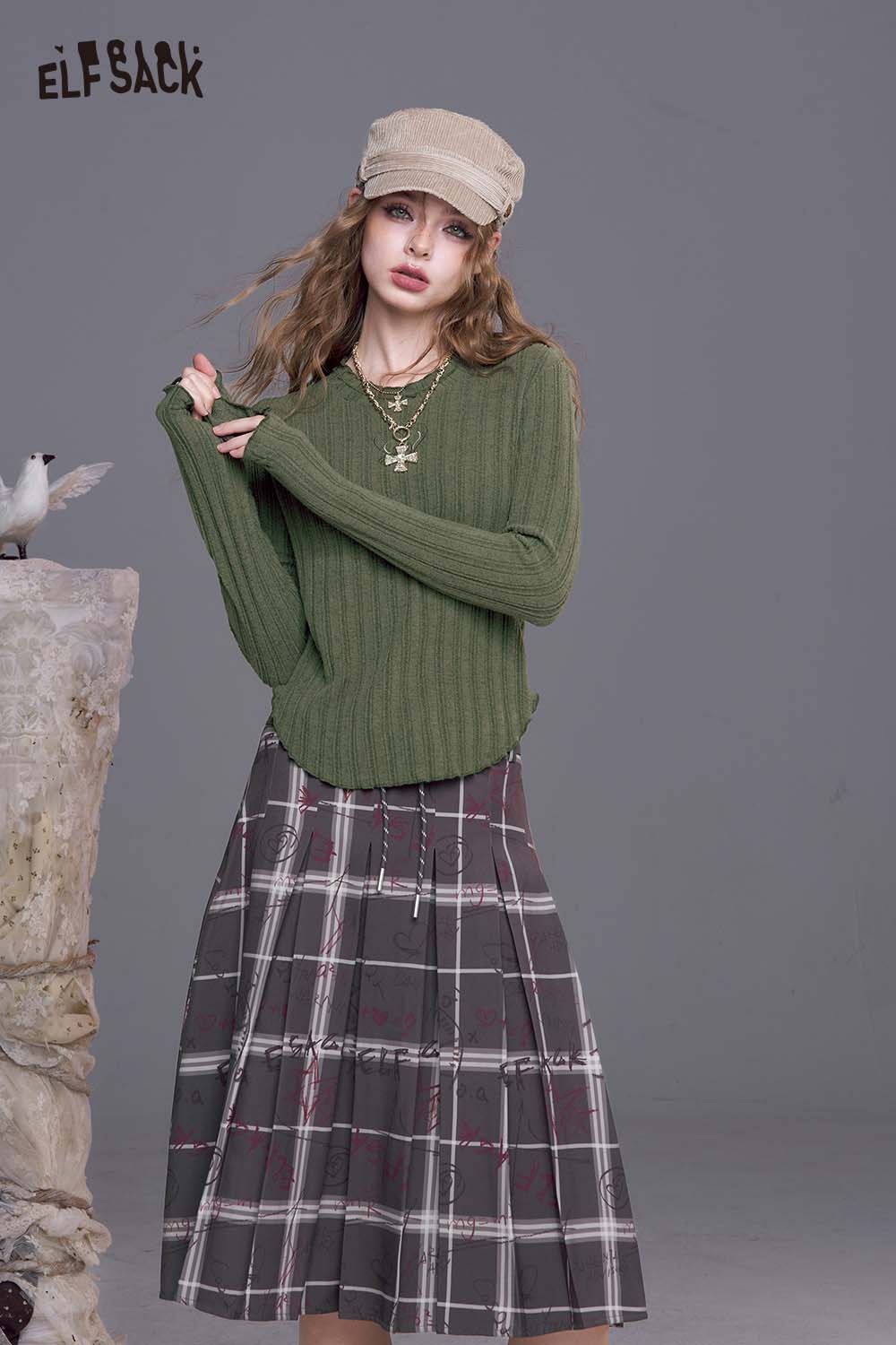 ELFSACK women's stretch knit top in olive green paired with a plaid skirt for a stylish look