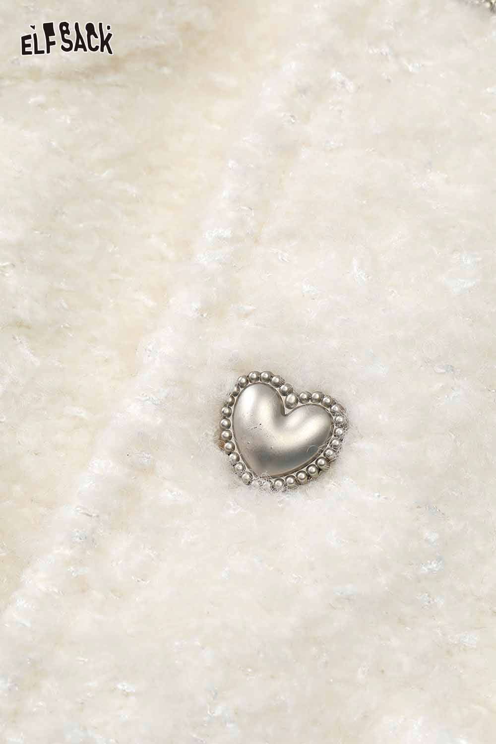 ELFSACK wool blend bow detail coat featuring a heart-shaped embellishment on a soft white fabric