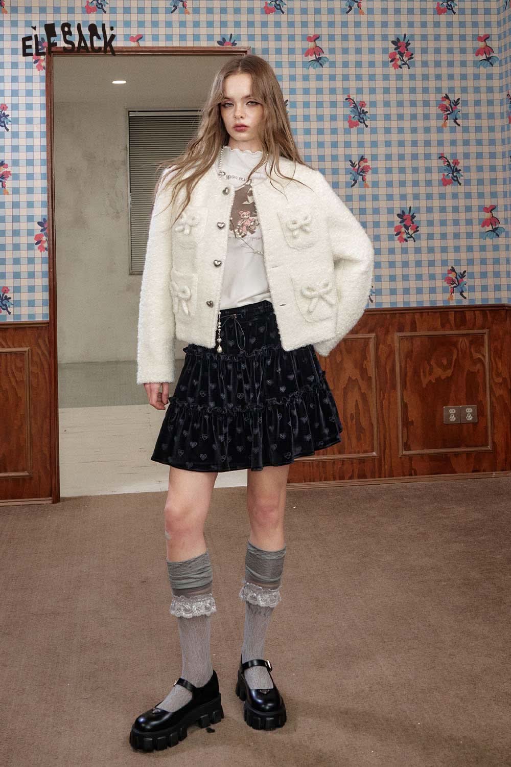 ELFSACK wool blend bow detail coat in white paired with a black skirt for a stylish fall look