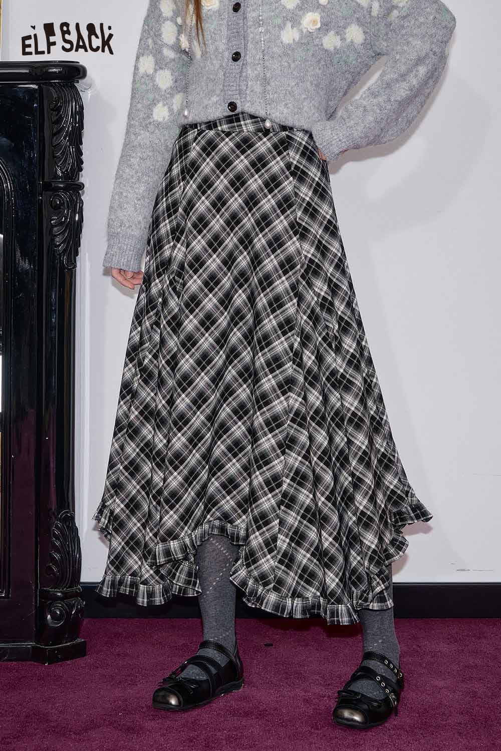 ELFSACK wool blend checkered skirt with flared hem styled with a cozy cardigan and black shoes