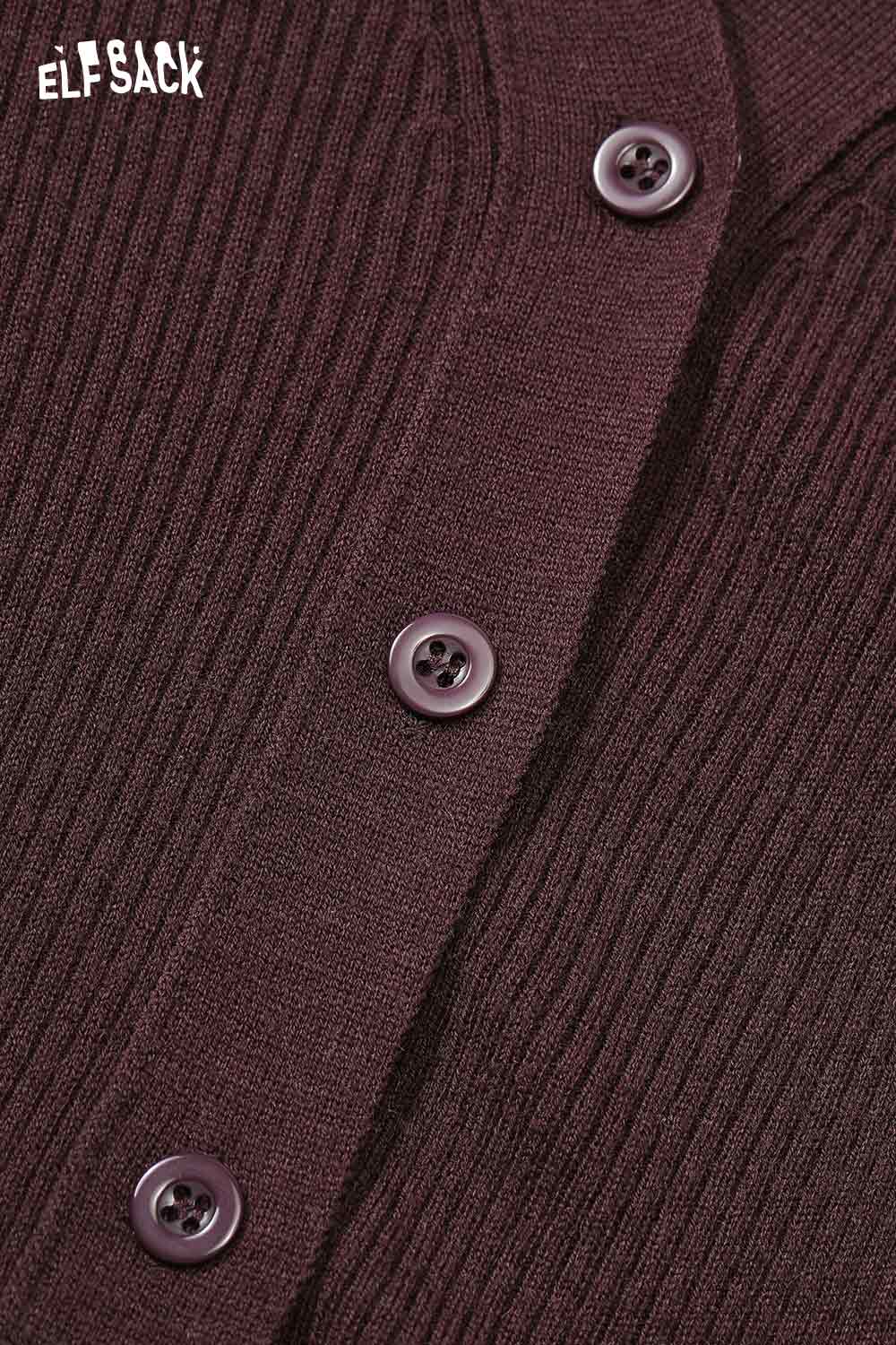 Close-up of ELFSACK wool blend lace knit top featuring ribbed texture and button details