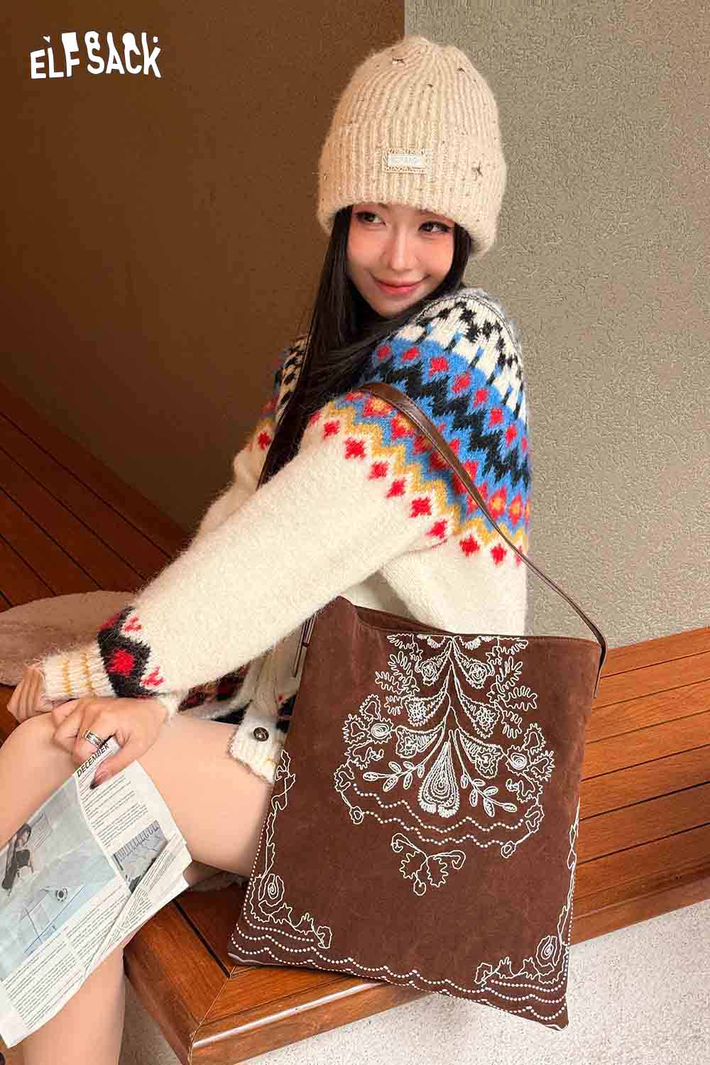 ELFSACK vintage bohemian tote bag displayed on a model wearing a cozy sweater and a knit hat