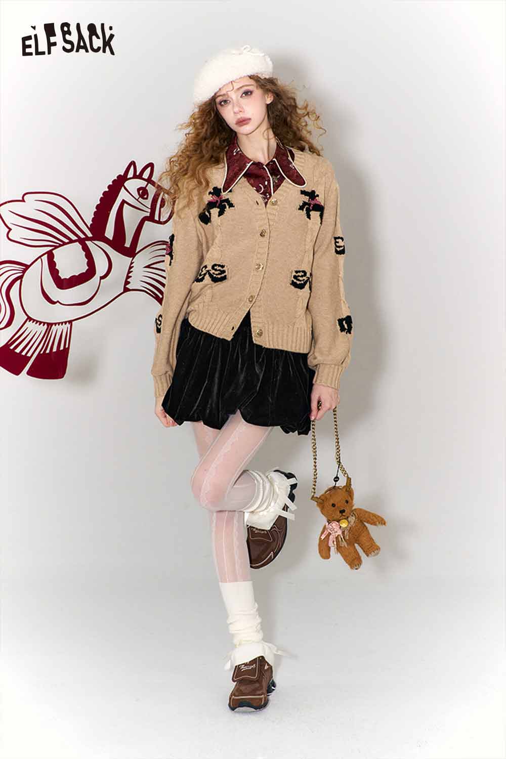 ELFSACK vintage bow jacquard cardigan in beige with black decorative bows, styled with a black skirt