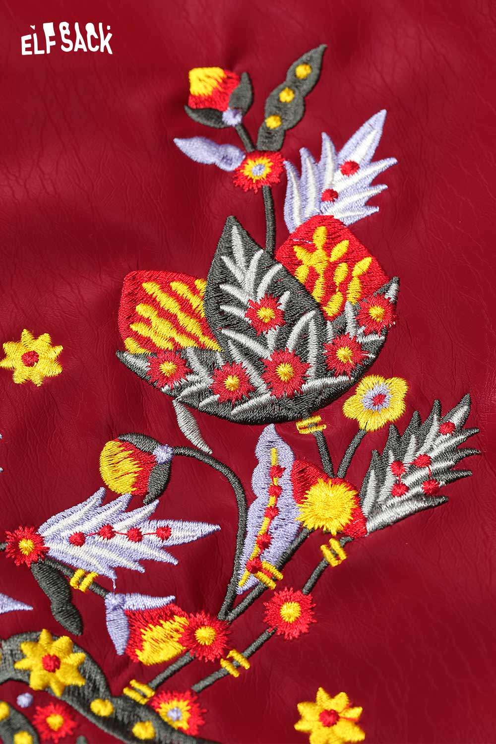 Vintage burgundy leather jacket women featuring vibrant floral embroidery details