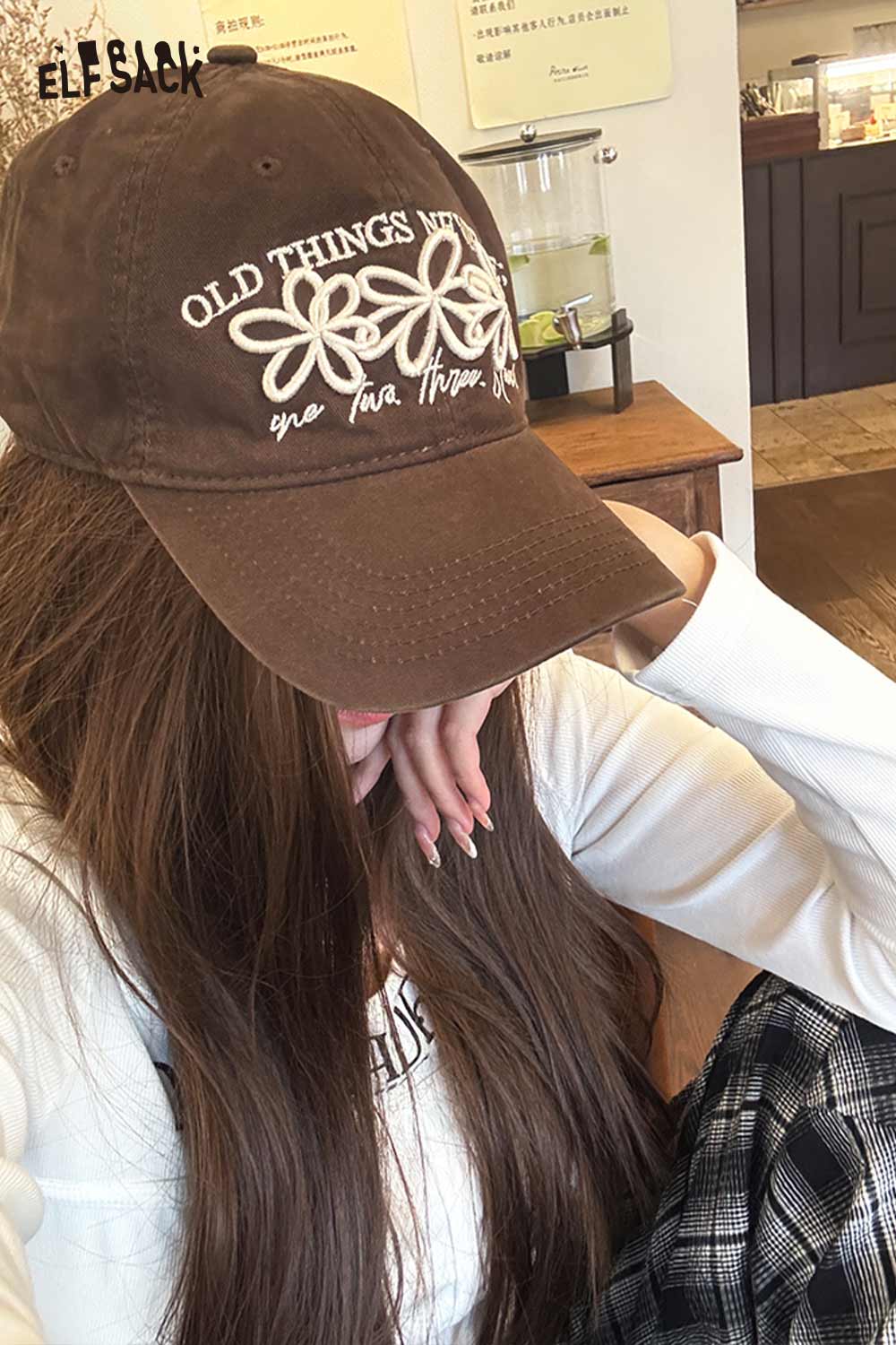 ELFSACK vintage flower embroidered baseball cap in brown with stylish floral design and text