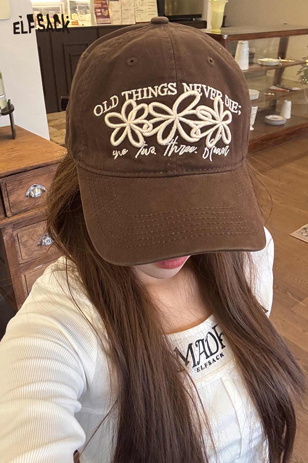 ELFSACK vintage flower embroidered baseball cap featuring a stylish floral design and phrase