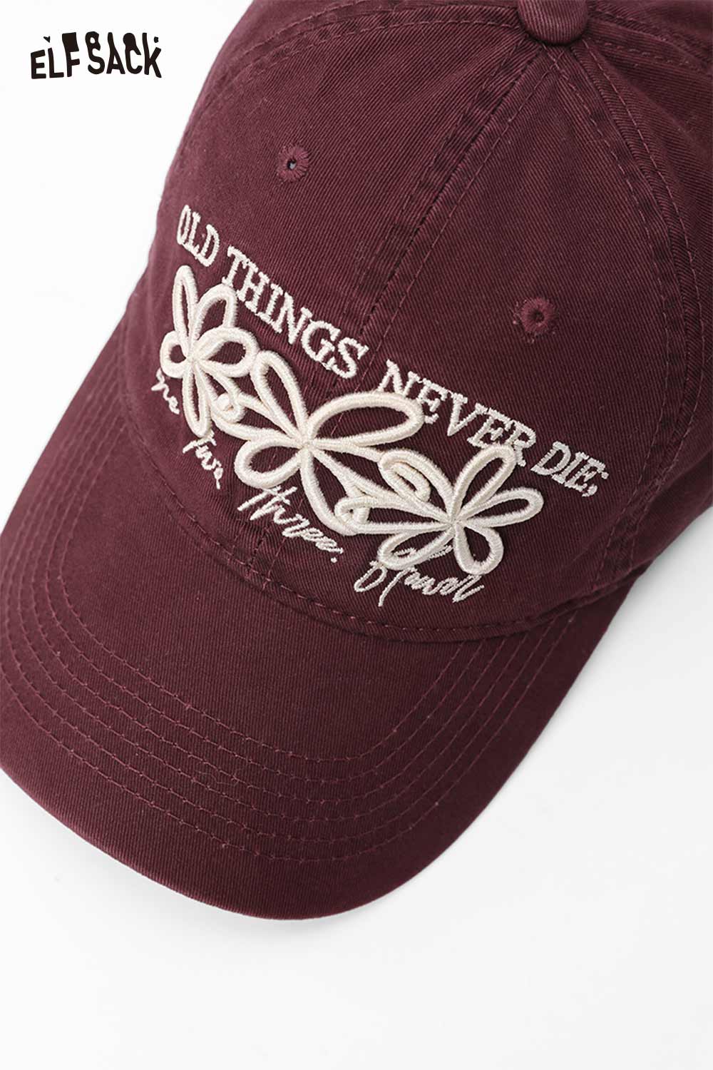 Vintage flower embroidered baseball cap in burgundy with a stylish floral design