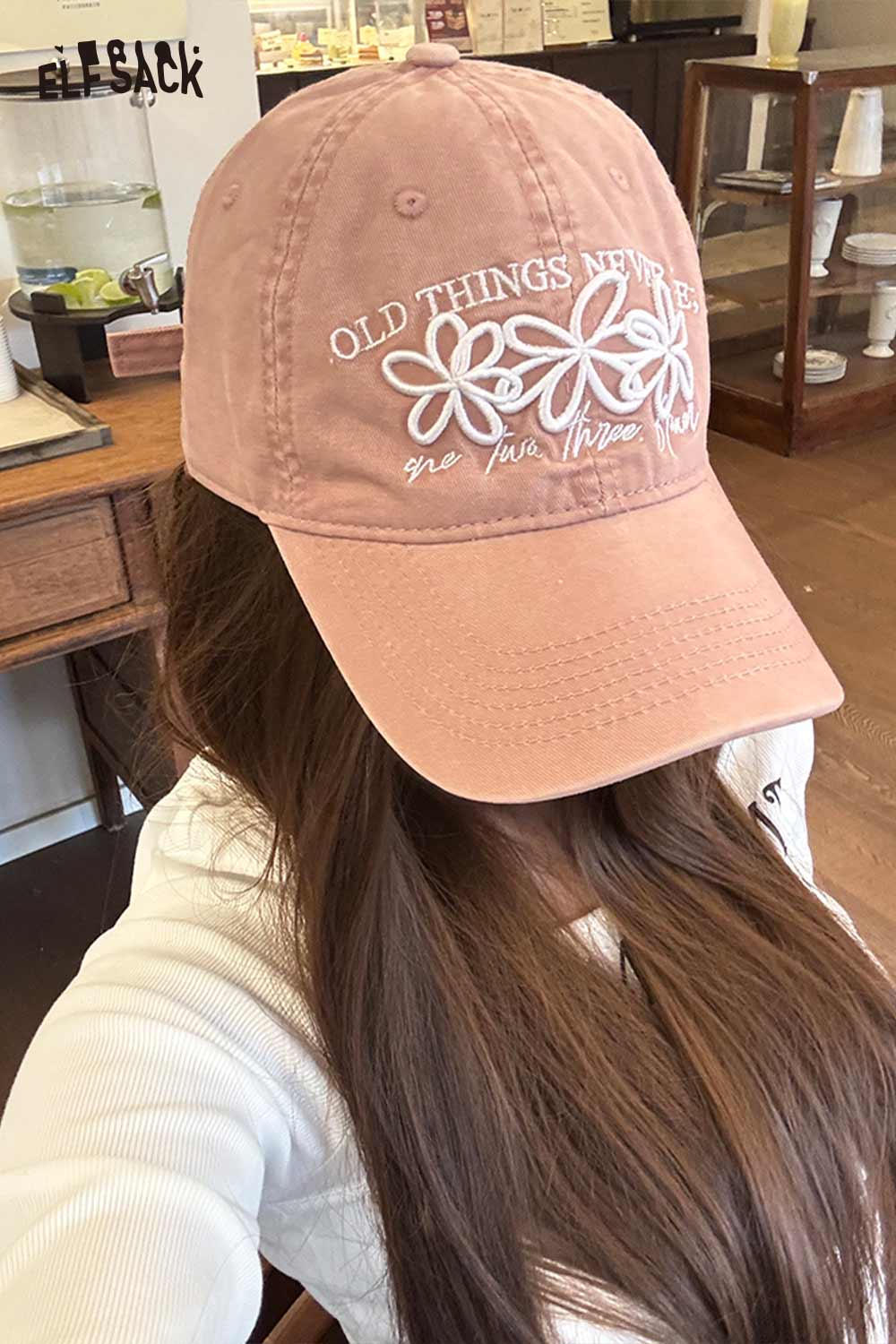 ELFSACK vintage flower embroidered baseball cap with a pink design featuring stitched flowers