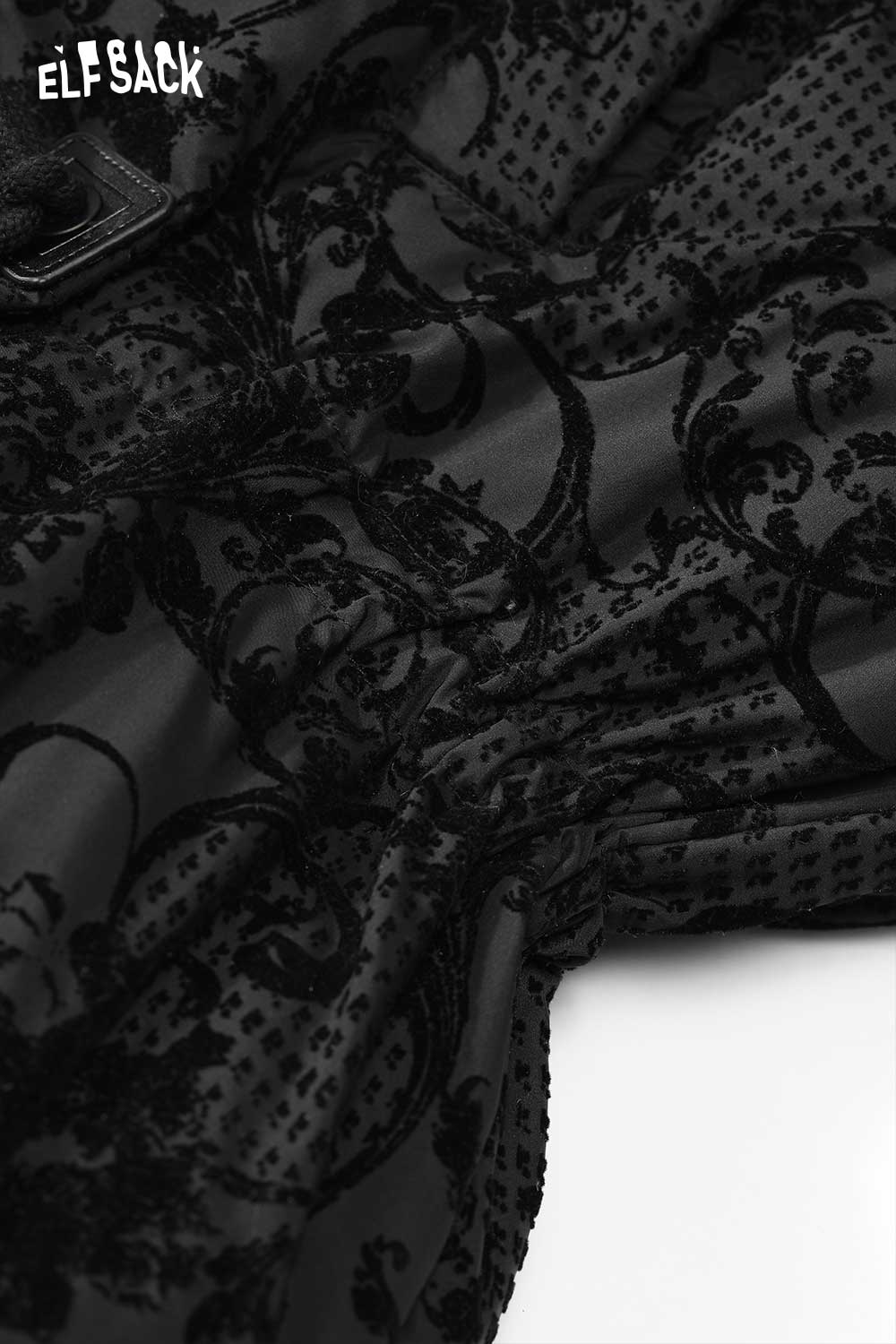 Close-up of vintage jacquard puffy down coat fabric with intricate black pattern and soft texture