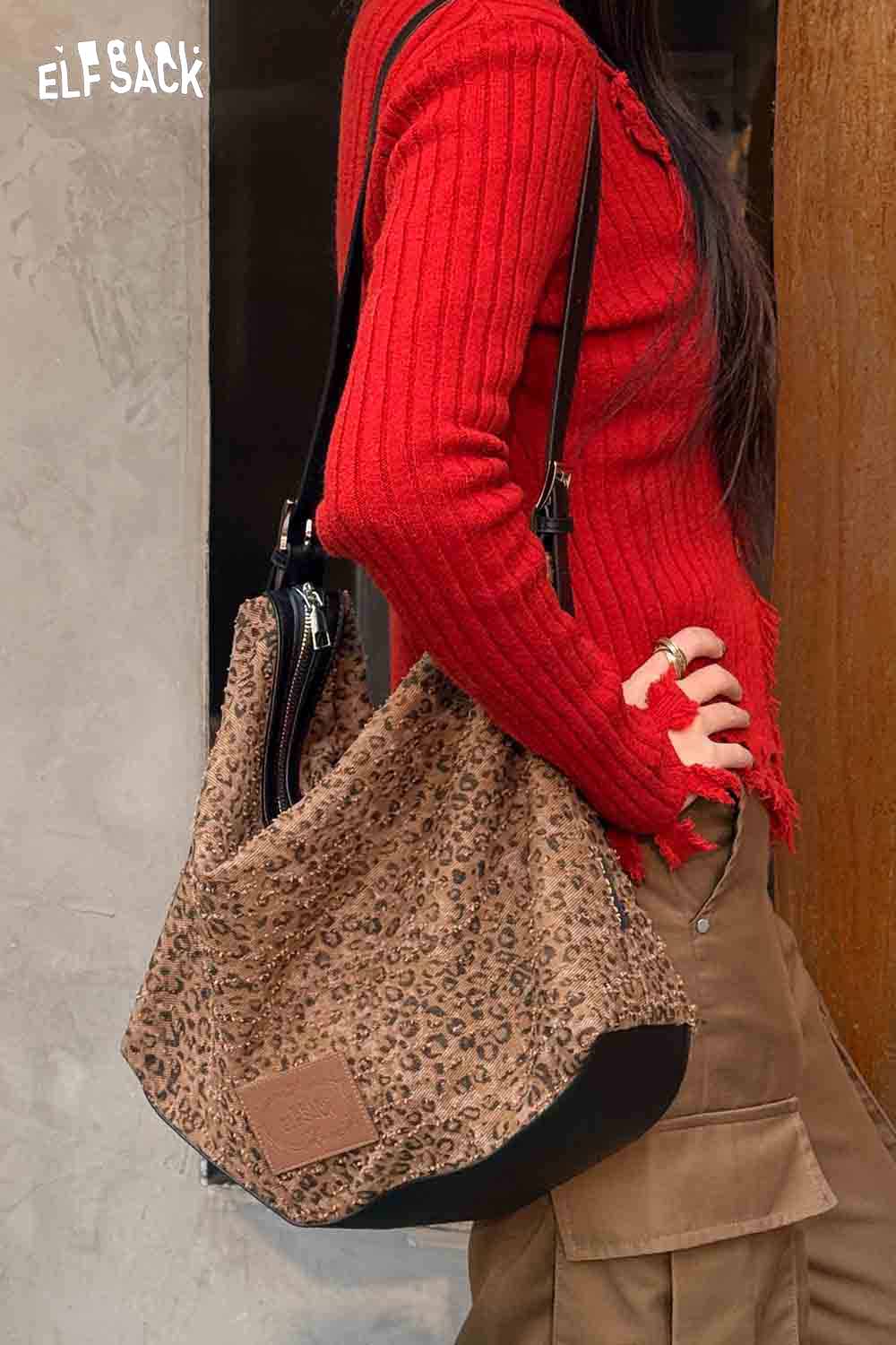 ELFSACK vintage leopard shoulder bag styled with a red ribbed sweater for a trendy look