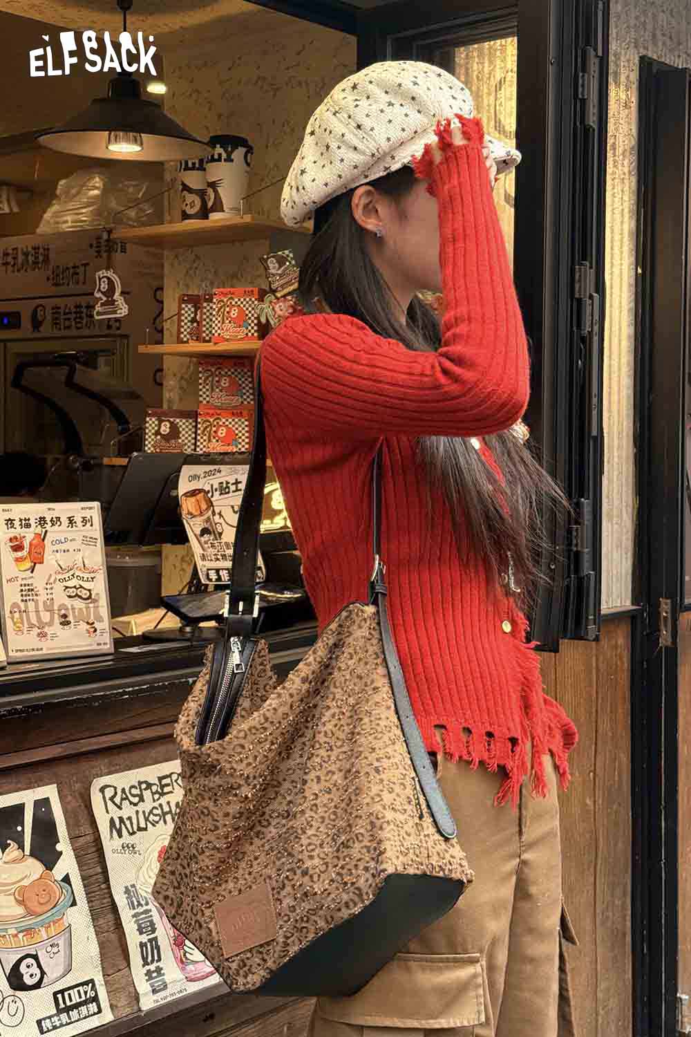 ELFSACK vintage leopard shoulder bag paired with a red sweater for a stylish casual look