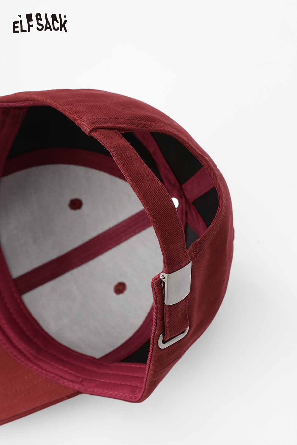 Interior view of ELFSACK vintage letter embroidery baseball cap with adjustable strap in burgundy color