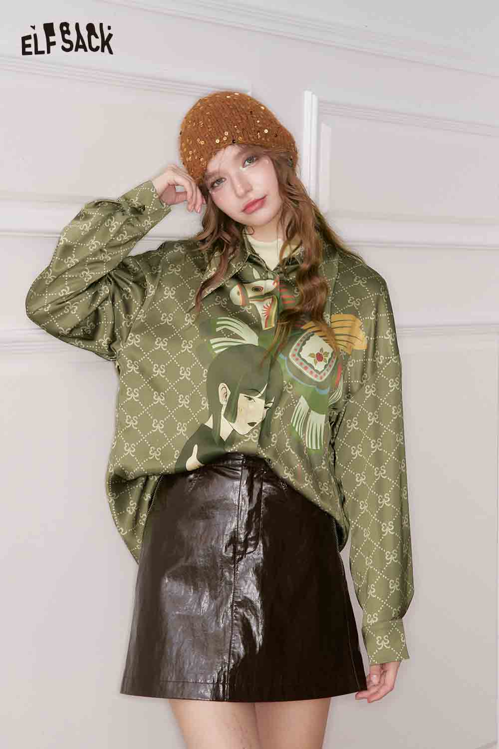 
                  
                    ELFSACK vintage portrait print shirt styled with a leather skirt and hat for a trendy look
                  
                
