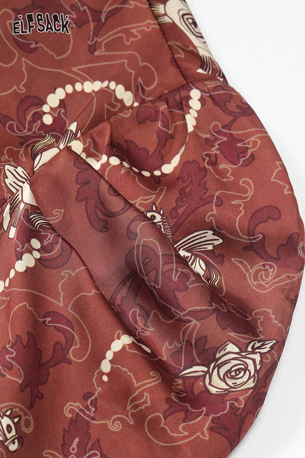 Close-up of ELFSACK vintage rose print shirt for women featuring intricate floral designs and rich colors
