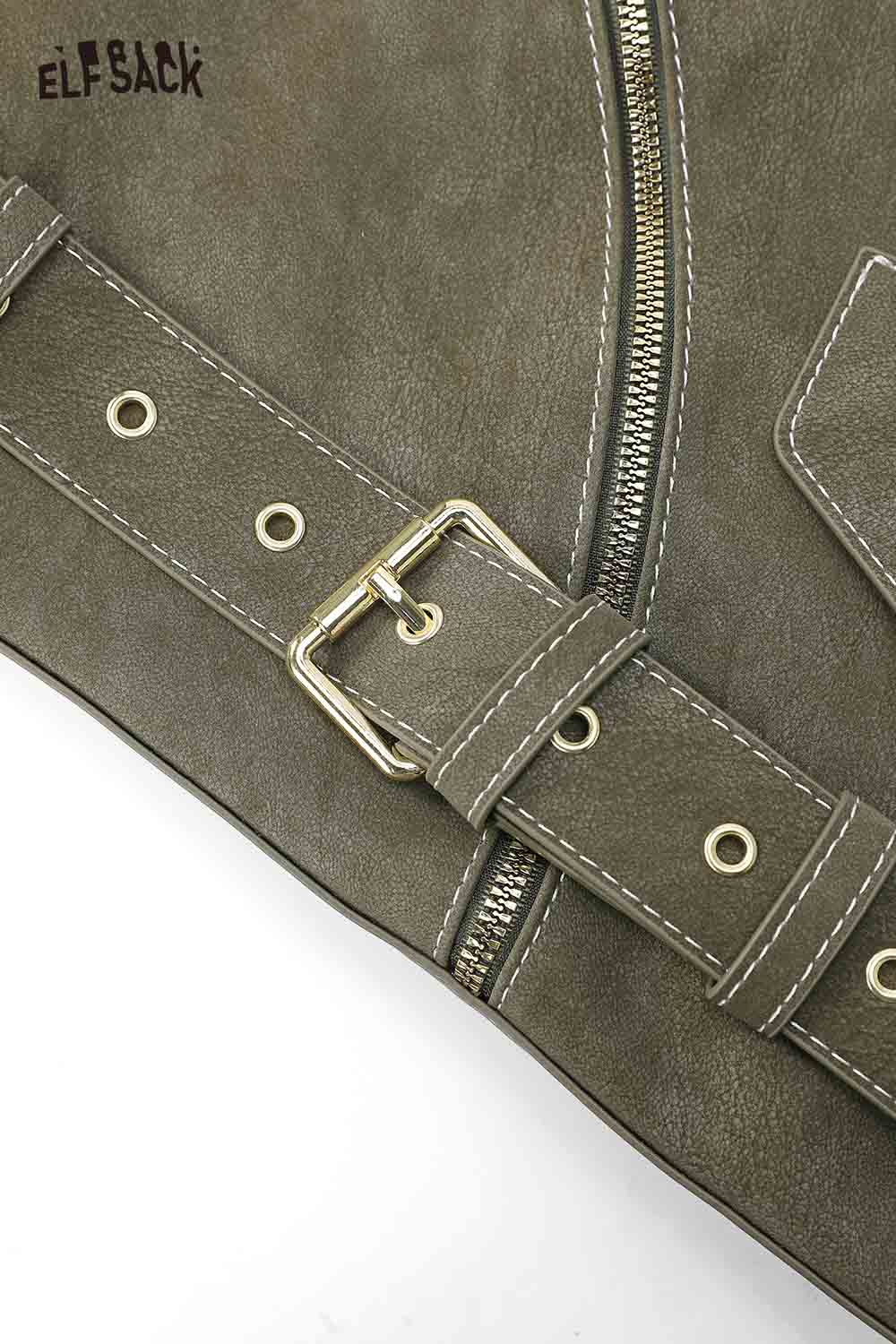 Close-up of a vintage suede shoulder bag by ELFSACK featuring detailed stitching and a stylish buckle