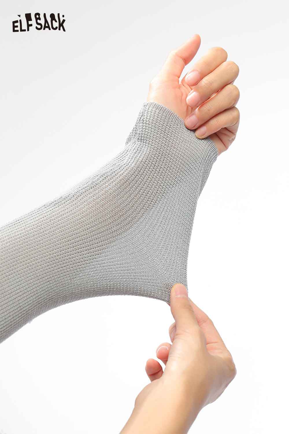 Stretchy ELFSACK viscose blend knit top for women in gray showcasing flexible sleeve design