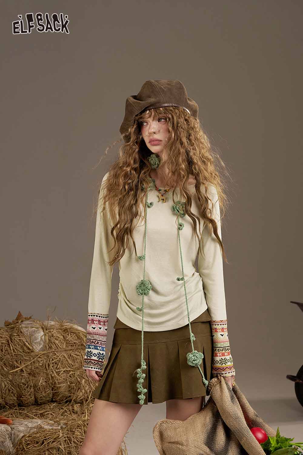 ELFSACK waist cinching long sleeve shirt with decorative floral details and stylish sleeves