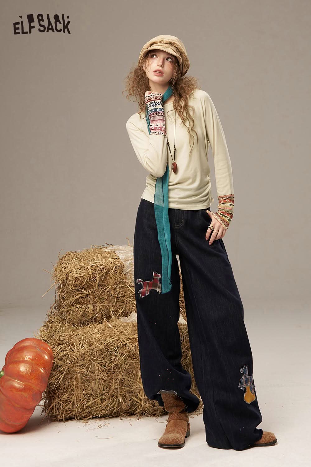 ELFSACK waist cinching long sleeve shirt styled with relaxed pants for a trendy autumn look