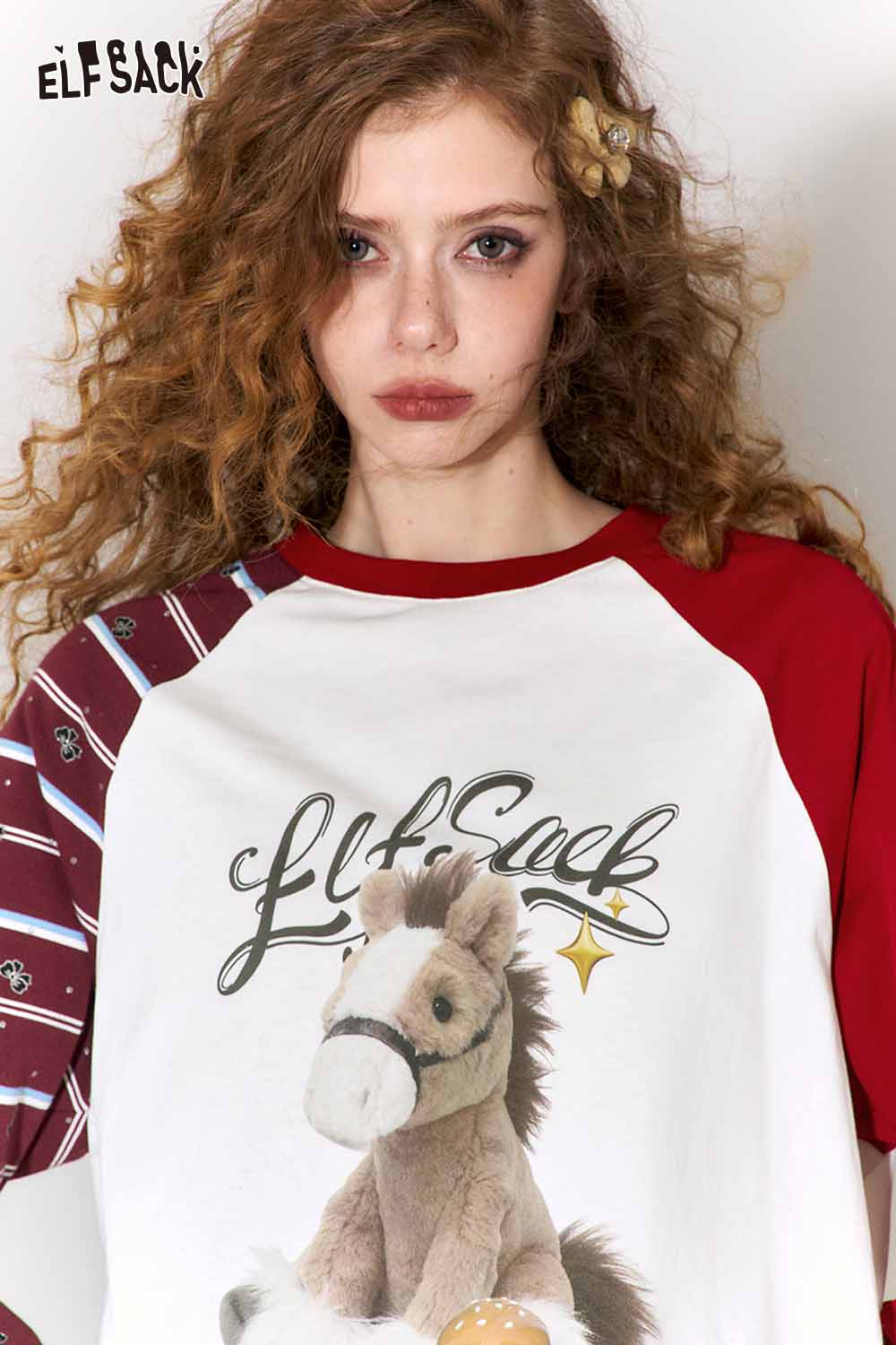 ELFSACK whimsical doll pony print t-shirt featuring a cute design on a relaxed fit style