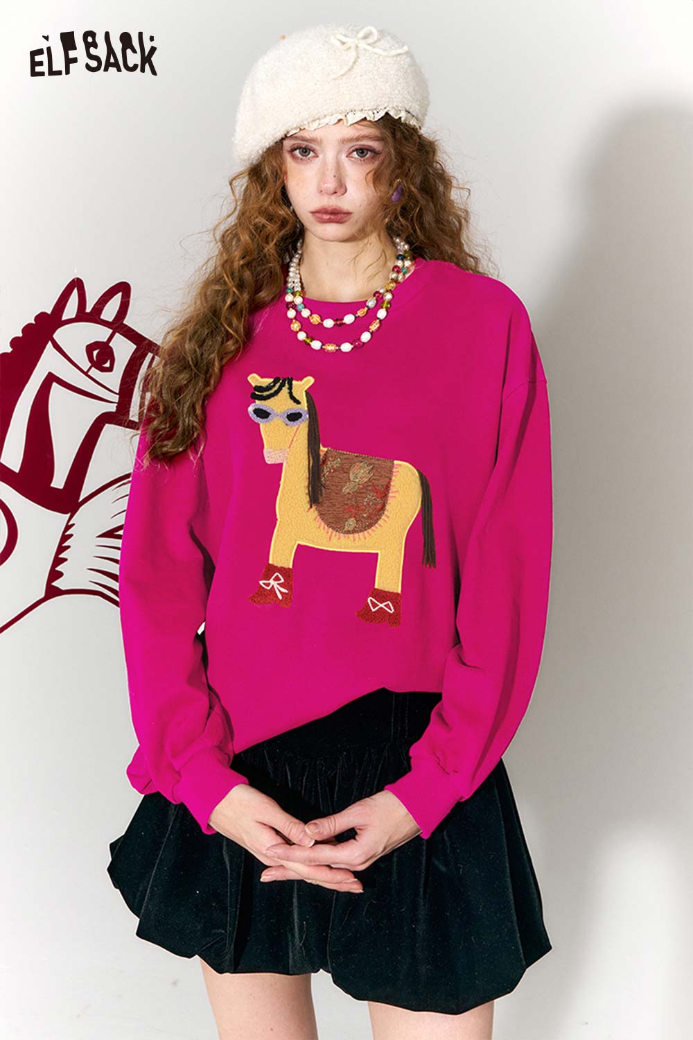 ELFSACK whimsical pony sweatshirt in vibrant pink featuring a colorful pony graphic