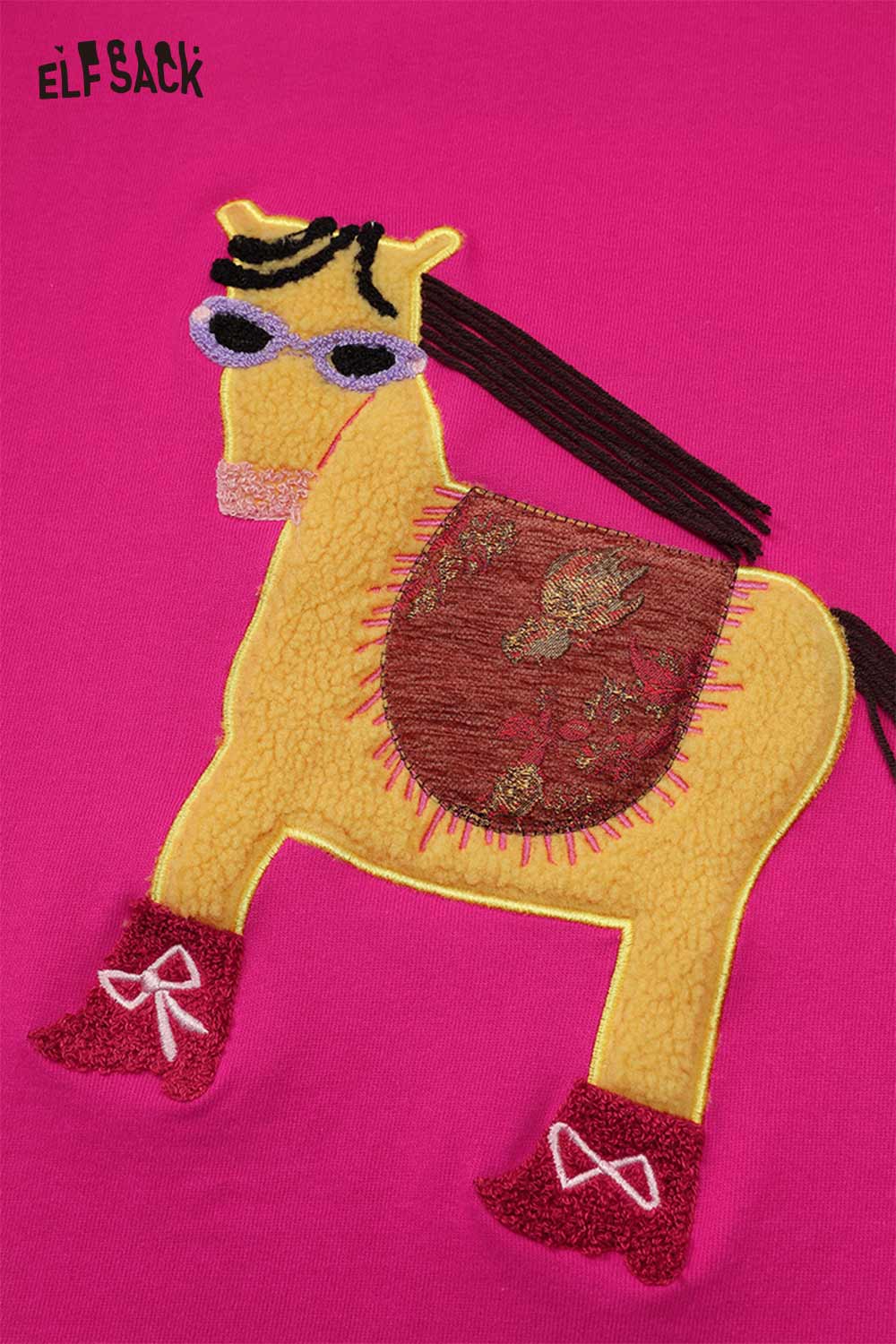 Bright pink whimsical pony sweatshirt featuring fun embroidered horse design with accessories