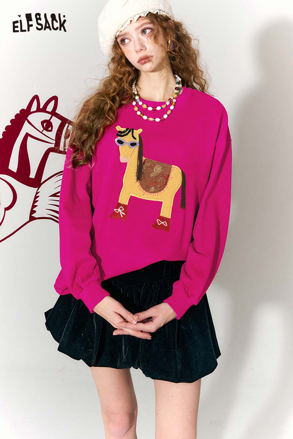 Bright pink whimsical pony sweatshirt featuring a playful horse design, perfect for casual chic outfits