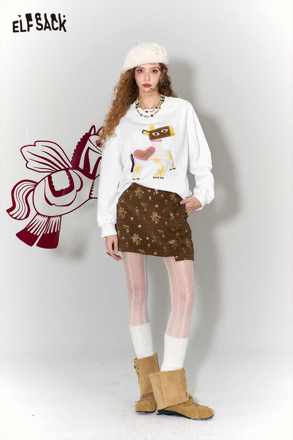 Model wearing whimsical pony sweatshirt from ELFSACK with a fun graphic design and stylish outfit