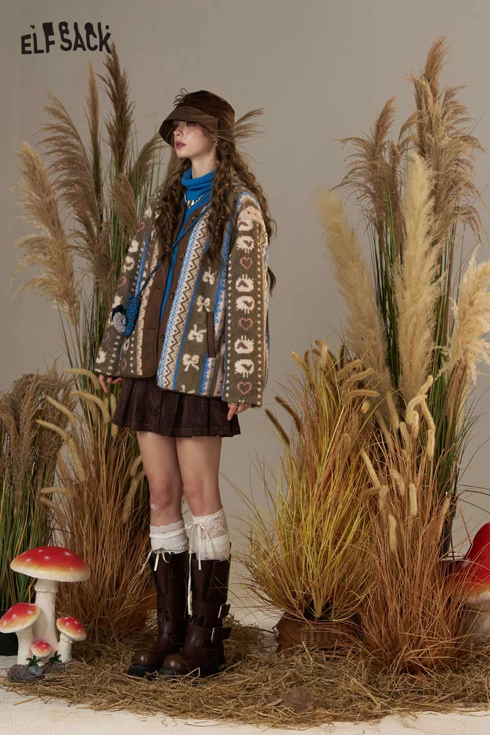 ELFSACK cartoon print short jacket for women with colorful patterns and relaxed fit, styled with a skirt and accessories