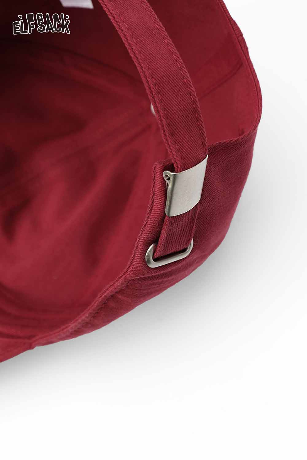 Interior view of ELFSACK women's embroidered baseball cap in maroon with adjustable strap detail