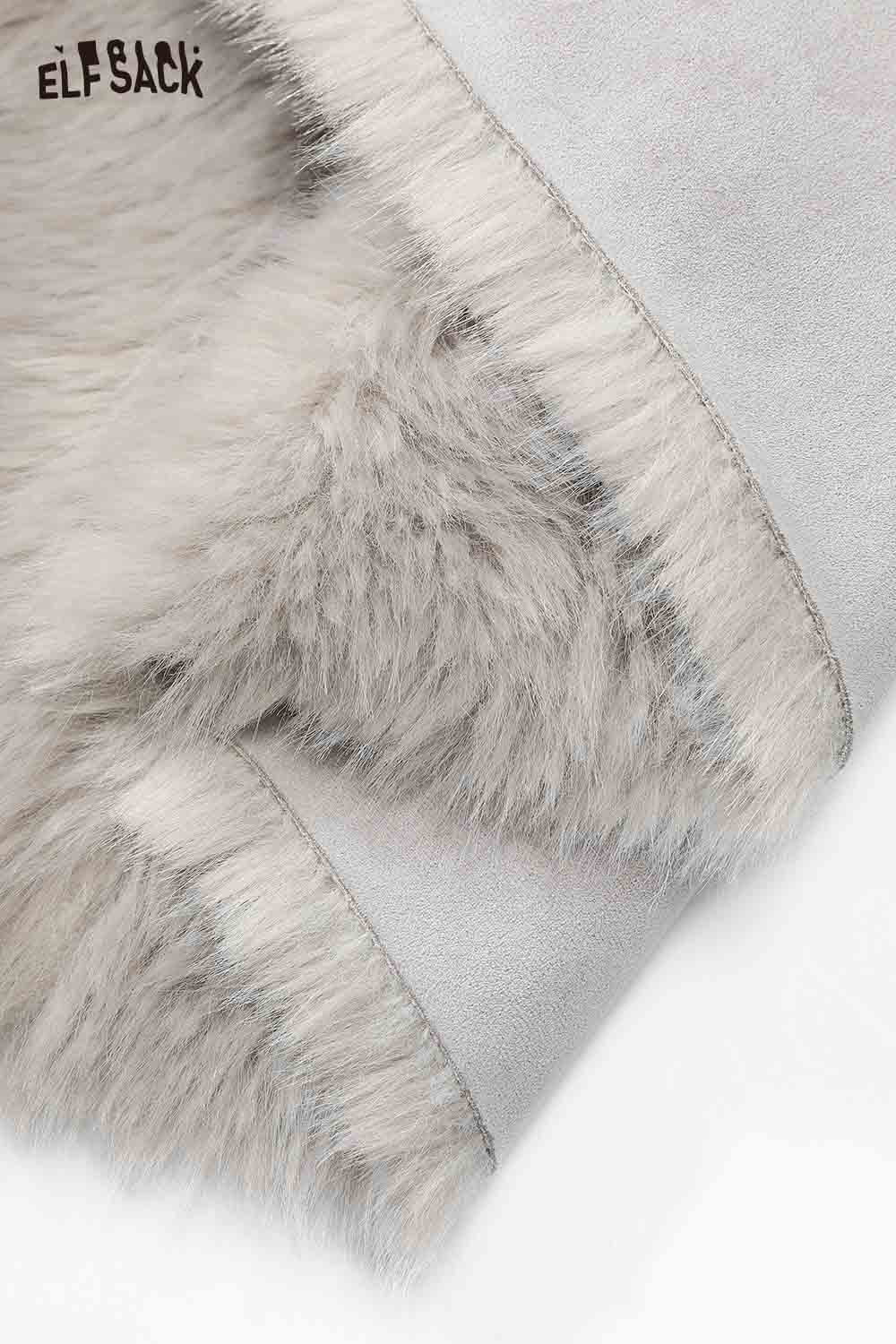 Soft and plush interior of ELFSACK long wool coat for women in a light gray color