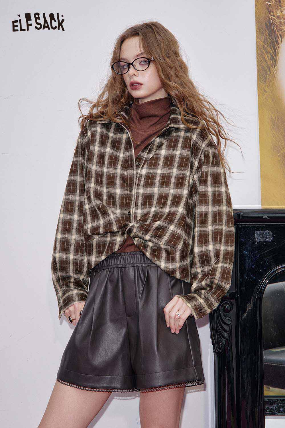 ELFSACK women's plaid button down shirt styled with a brown turtleneck and leather shorts