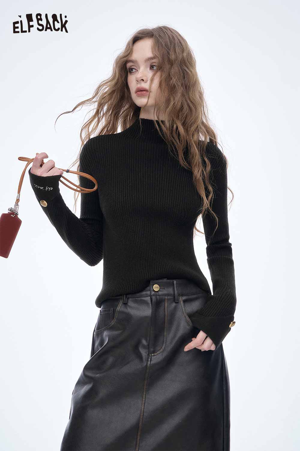ELFSACK women's slim fit knit sweater in black paired with a stylish leather skirt