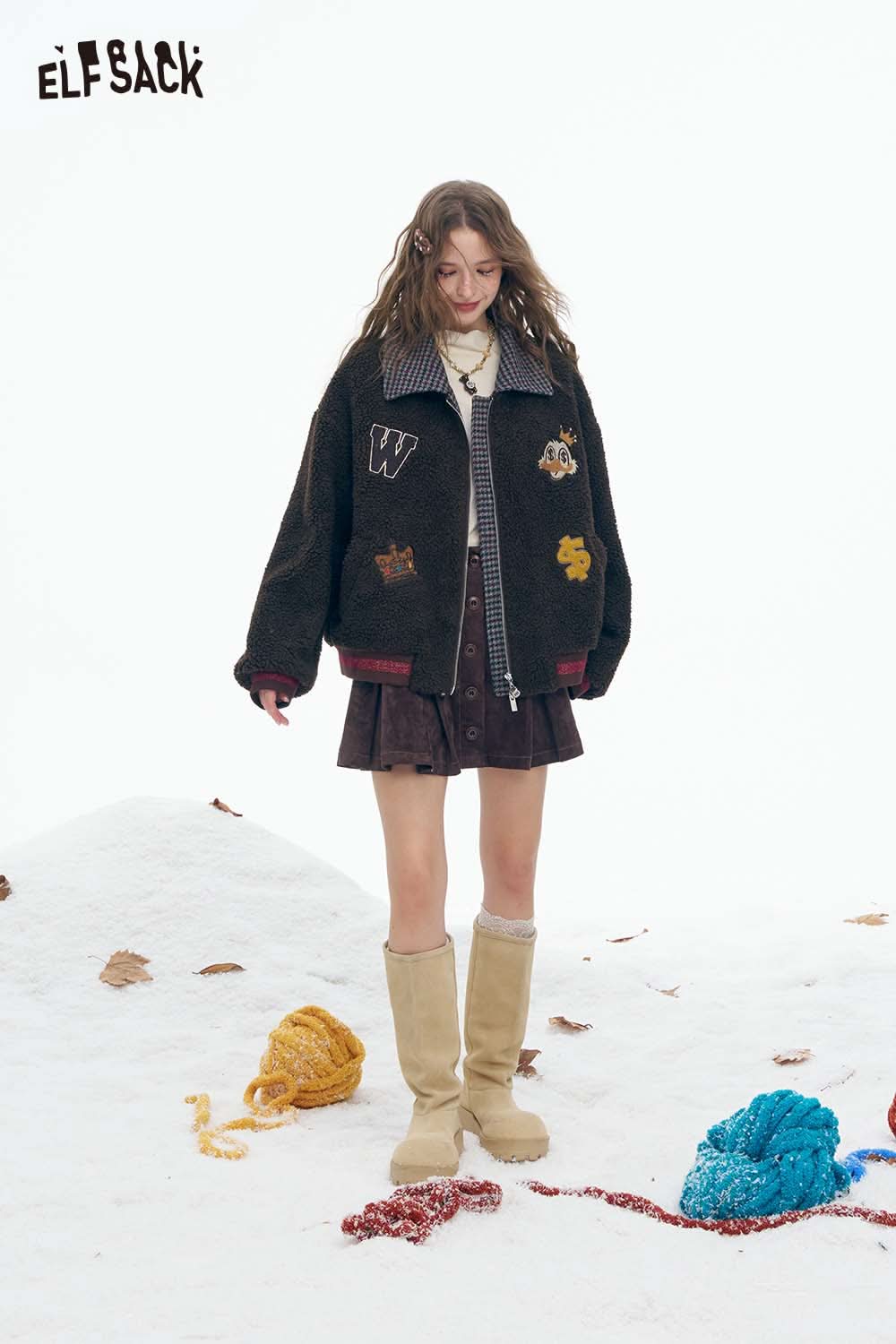 ELFSACK soft cotton striped coat for women with embroidered patches and a relaxed fit, perfect for winter style.