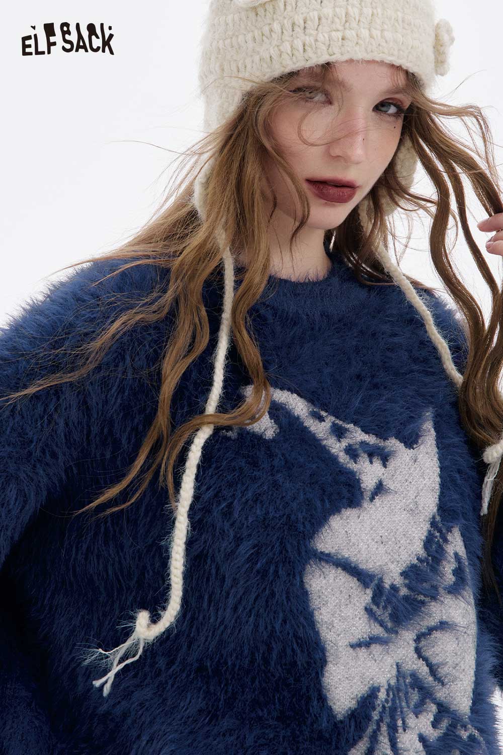 ELFSACK soft graphic plush sweater for women in blue with a stylish design and fluffy texture