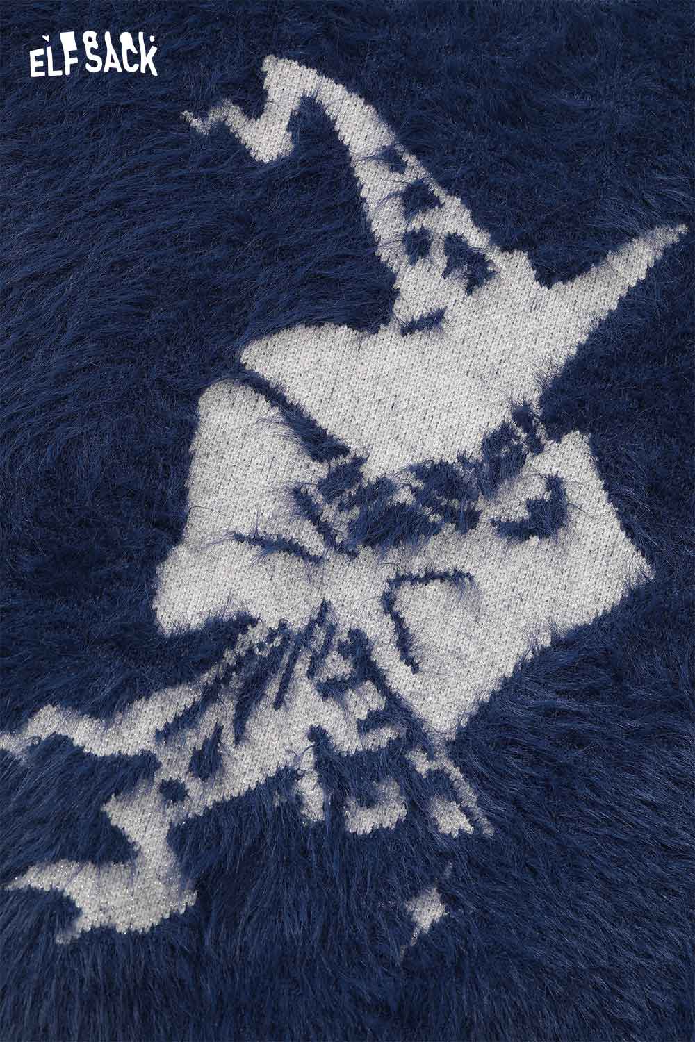 ELFSACK soft graphic plush sweater for women featuring a stylish witch design in navy and white