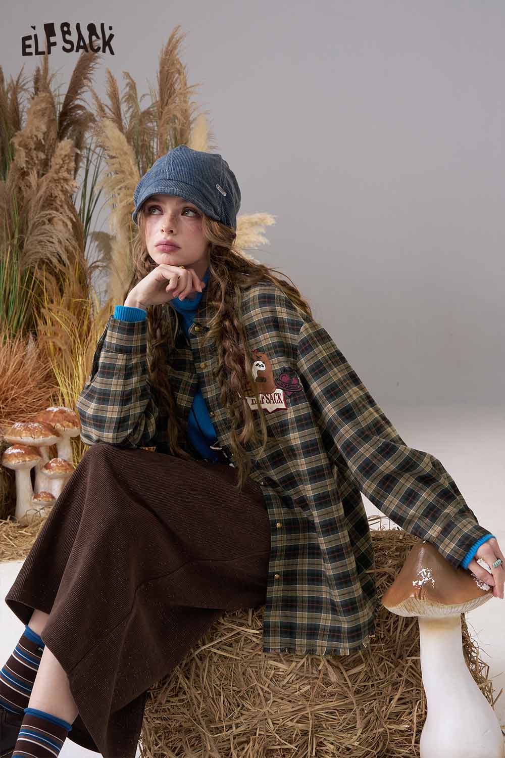ELFSACK women's bear embroidery plaid shirt styled with a blue top and brown skirt in a cozy setting