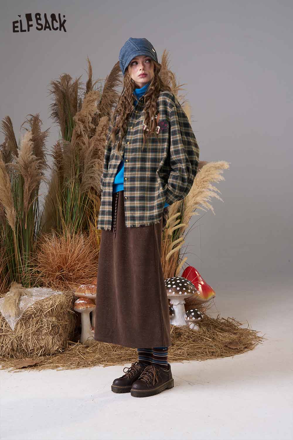 ELFSACK women's bear embroidery plaid shirt styled with a blue top and brown skirt for a trendy look