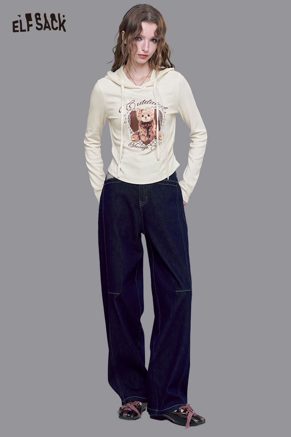 ELFSACK women's bear graphic hoodie in cream featuring a playful bear design and a cozy fit