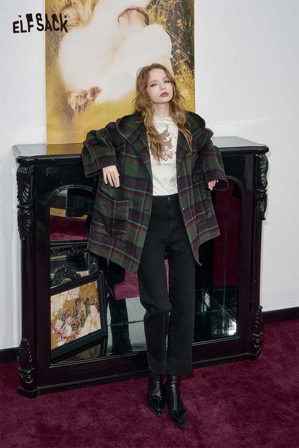 ELFSACK women's black denim straight leg pants styled with a plaid coat for a chic look