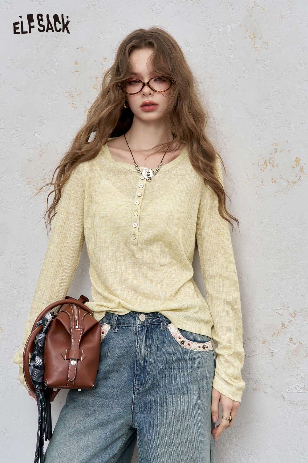 ELFSACK women's brushed jersey baselayer in soft yellow with button details and relaxed fit