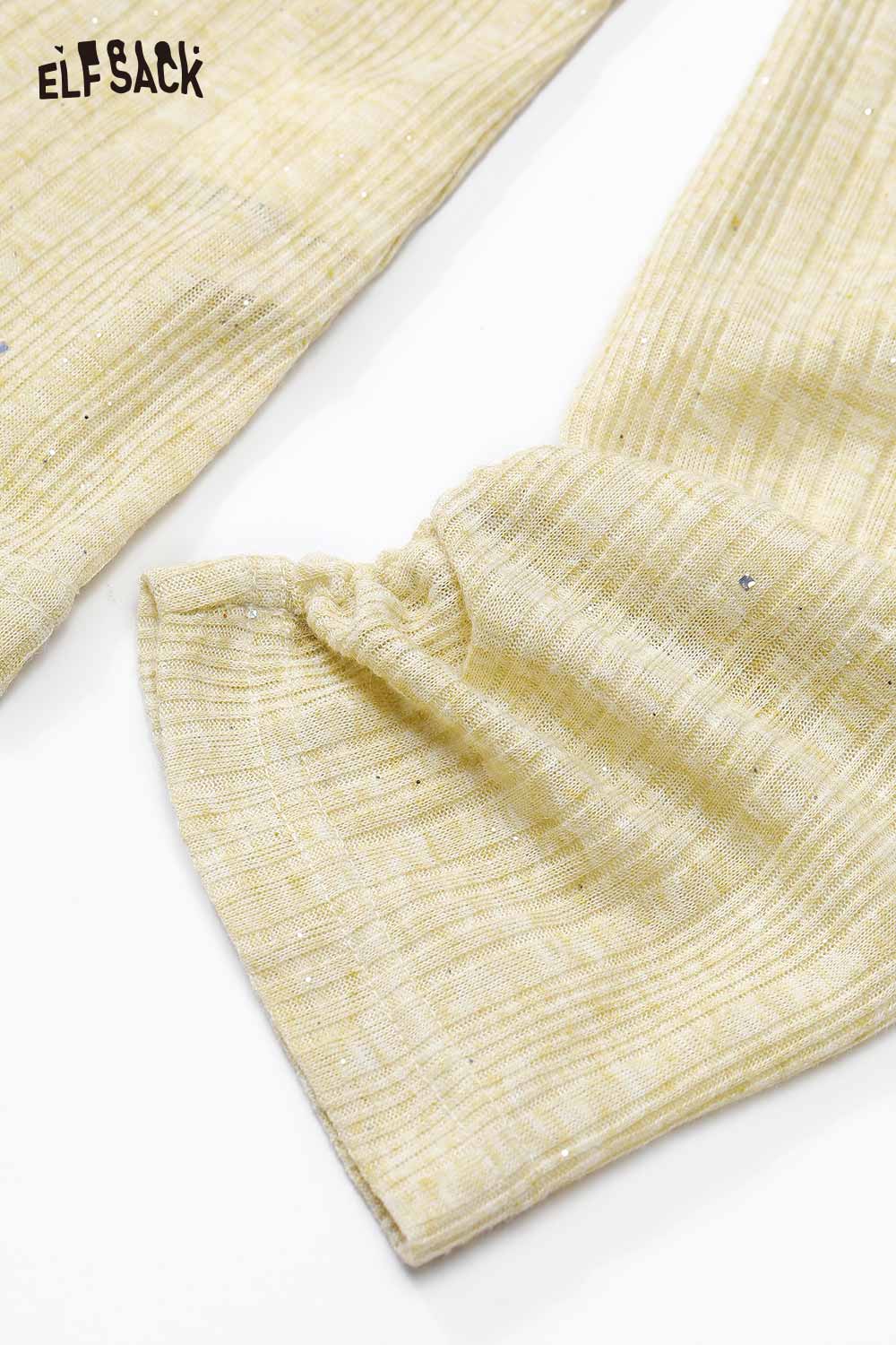 Close-up of ELFSACK women's brushed jersey baselayer in soft yellow fabric with textured details