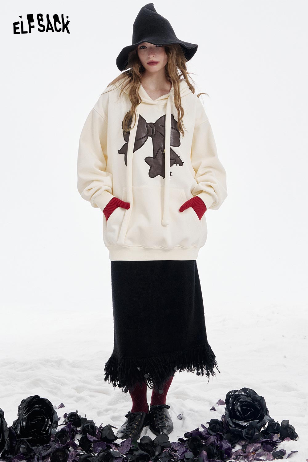 ELFSACK women's casual graphic hoodie in cream with unique bow design for trendy casual wear