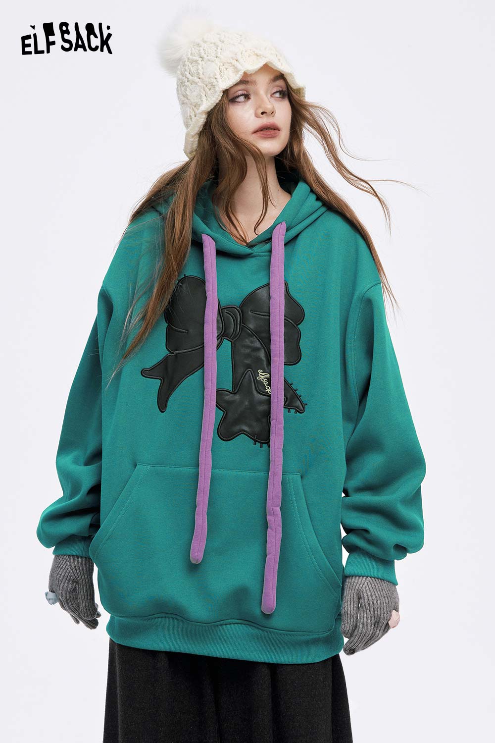 ELFSACK women's casual graphic hoodie in teal with bold design and purple drawstrings