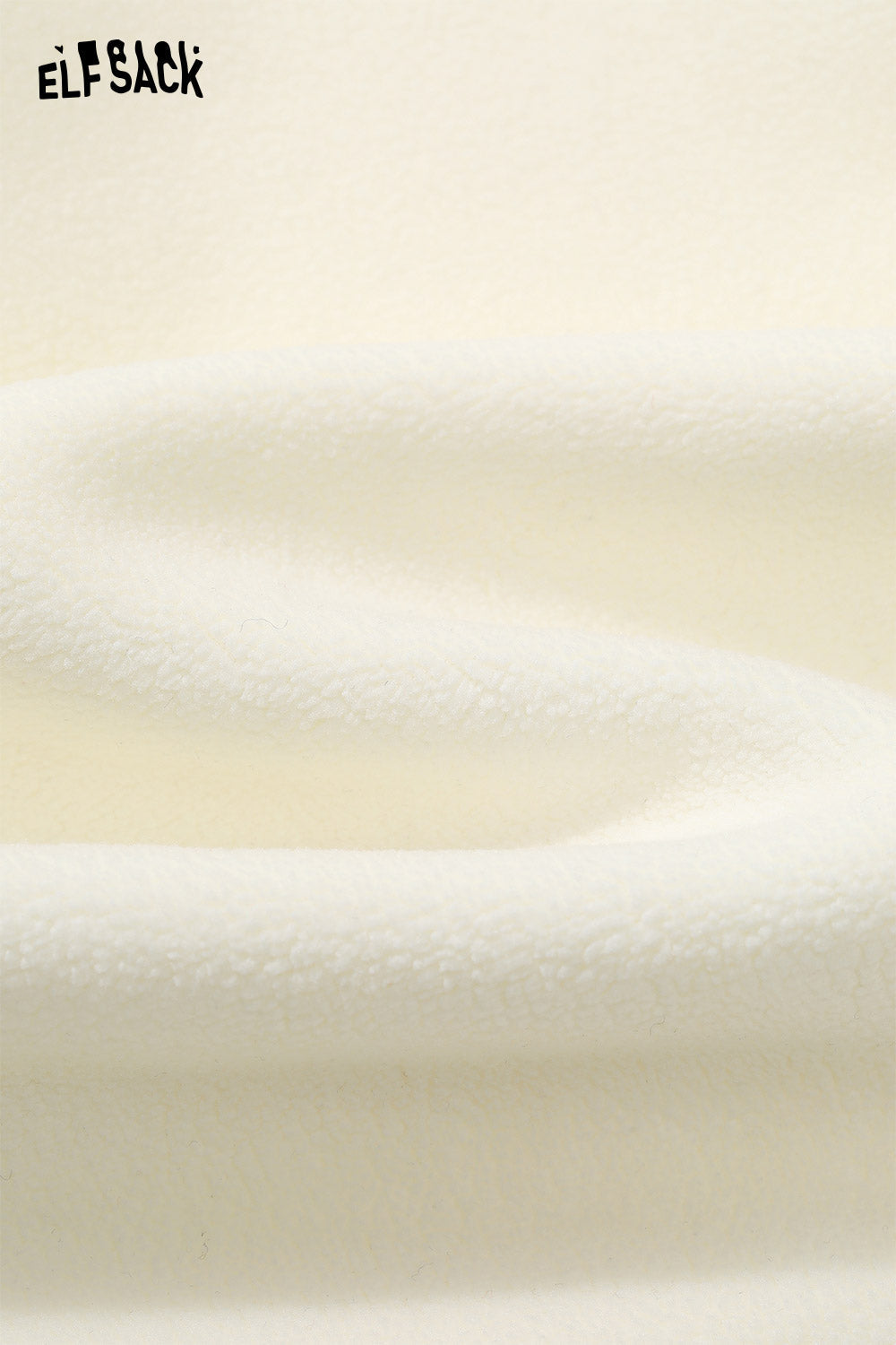 Soft white fabric of ELFSACK women's casual graphic hoodie showing cozy texture and warmth